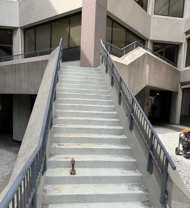 Commercial iron railings on exterior stairs