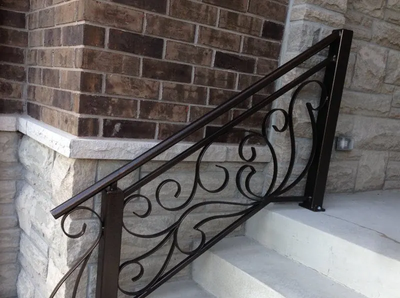 Step railing with scroll details