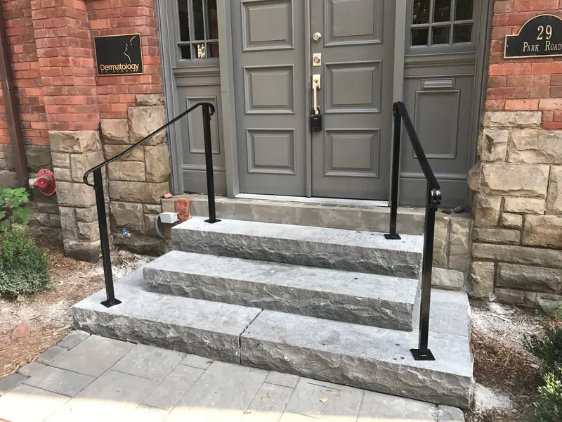 Iron handrail on front entrance steps